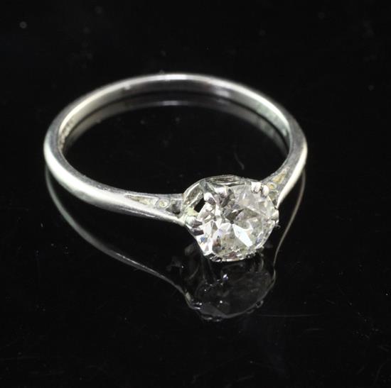 A platinum and solitaire diamond ring, size N.